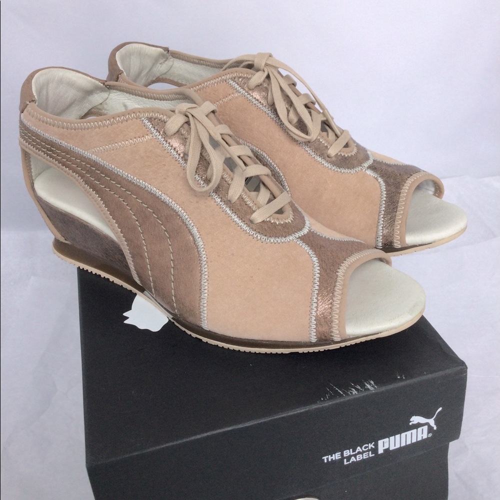 Puma Black label Ferro wedge sandal size 7 with  2”wedge heel. Excellent cond.